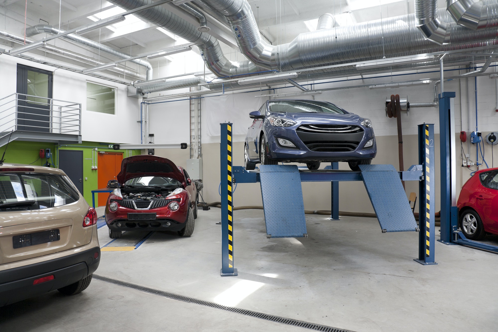 cars-in-a-large-repair-workshop-or-garage-.jpg